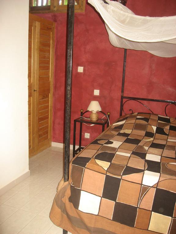 Babao Hotel Мбур Стая снимка