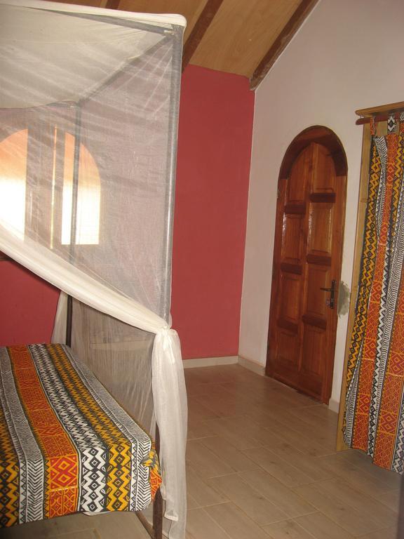Babao Hotel Мбур Стая снимка