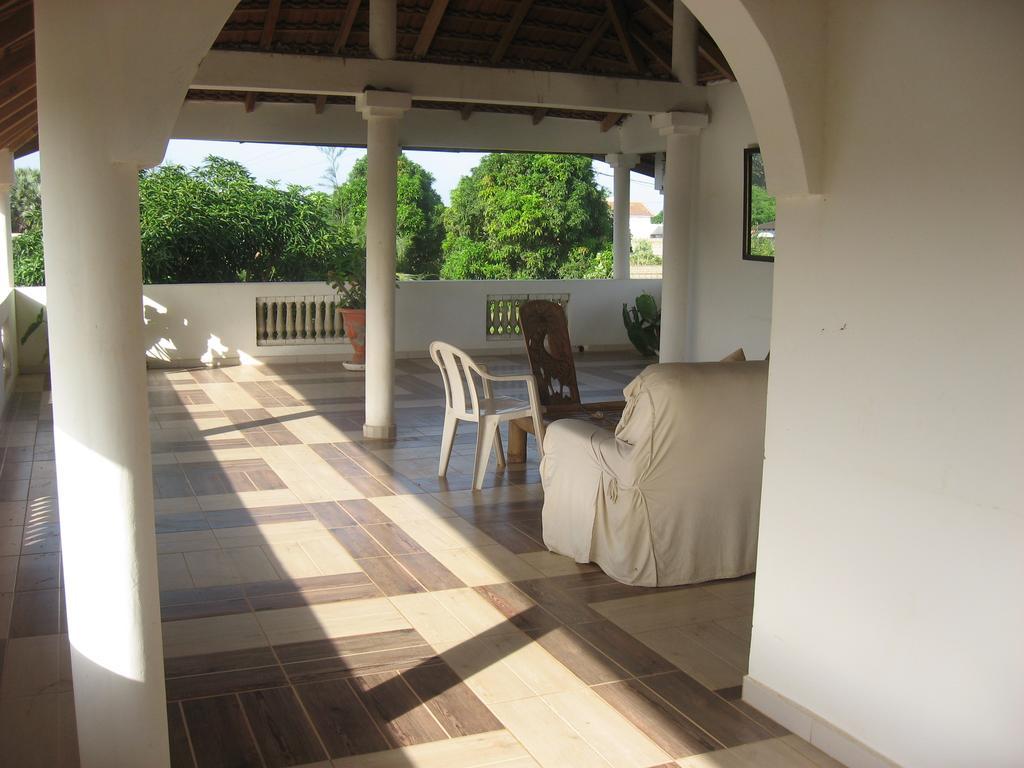 Babao Hotel Мбур Стая снимка