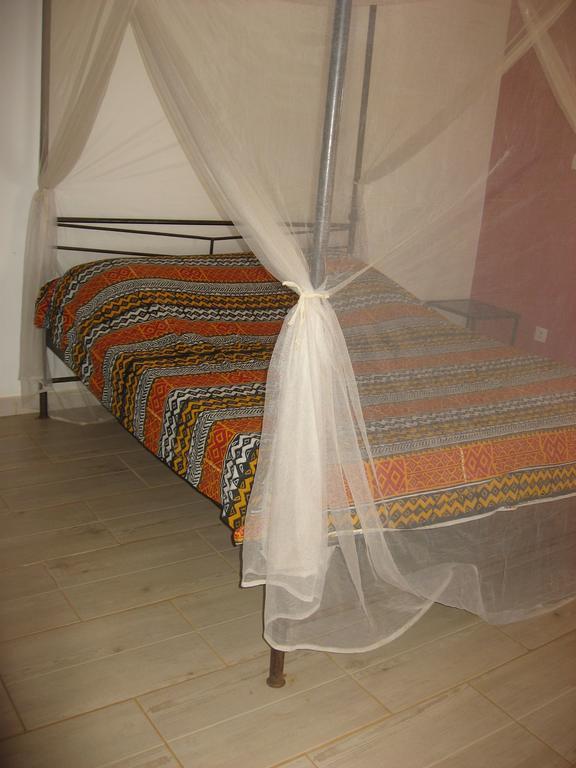 Babao Hotel Мбур Стая снимка