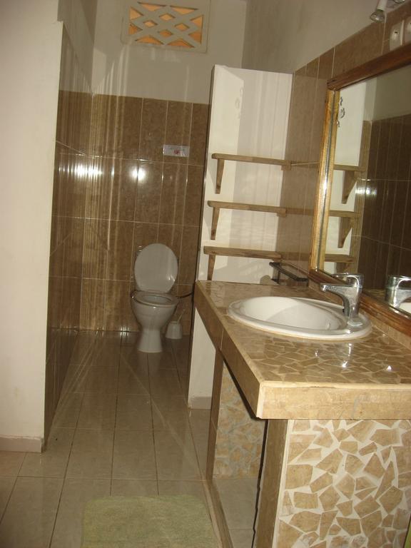 Babao Hotel Мбур Стая снимка