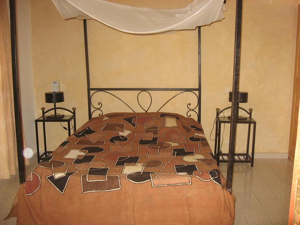Babao Hotel Мбур Стая снимка