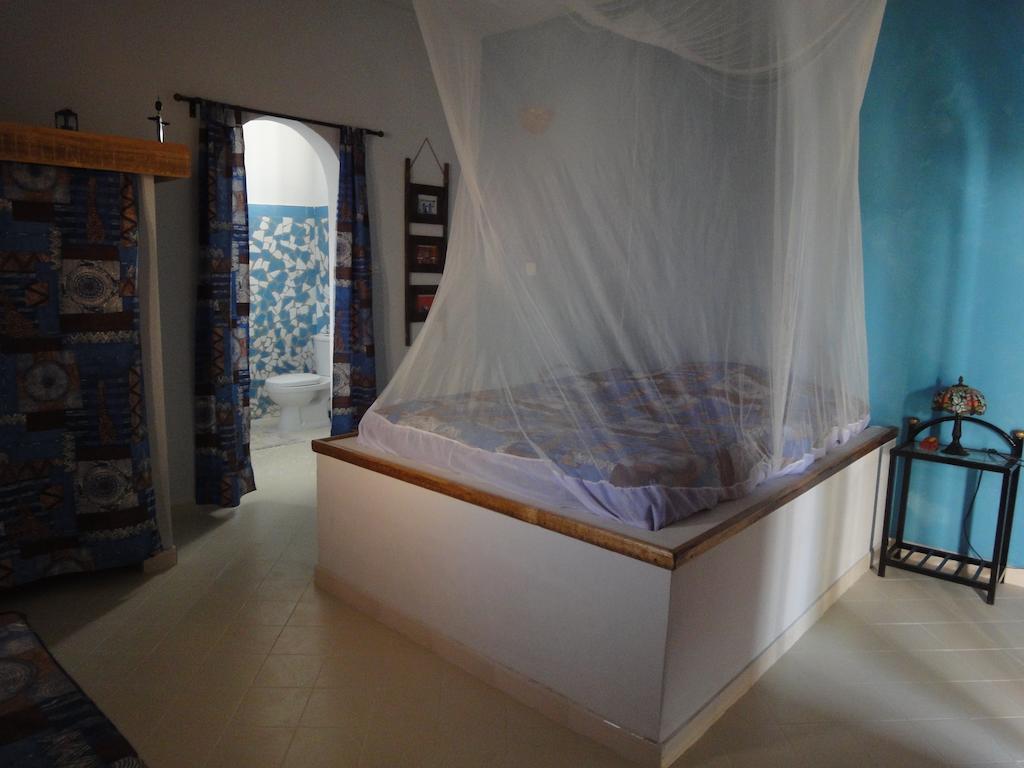 Babao Hotel Мбур Стая снимка